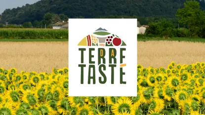 Logo di Terre da tastè su sfondo di campo di girasoli